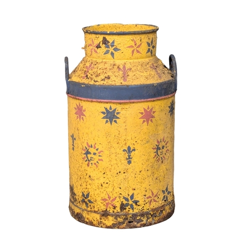 578 - A vintage painted milk churn. 66cm