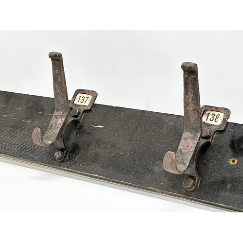 231B - A large Early 20th Century hat and coat rack. 130cm