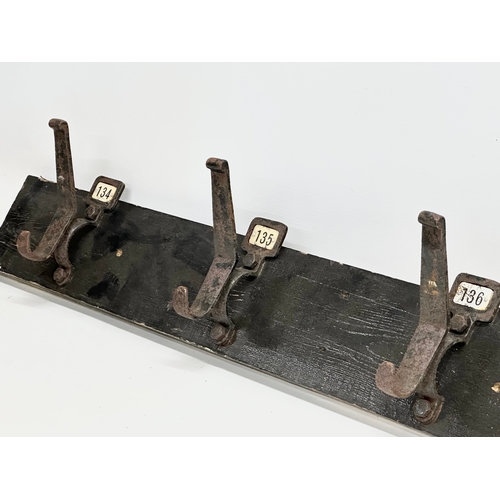 231B - A large Early 20th Century hat and coat rack. 130cm