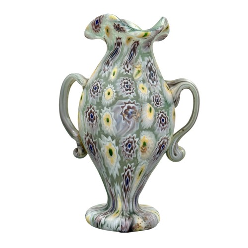 23 - Fratelli Toso. A rare Murano Millefiori glass vase by Fratelli Toso. 7x5x10cm.