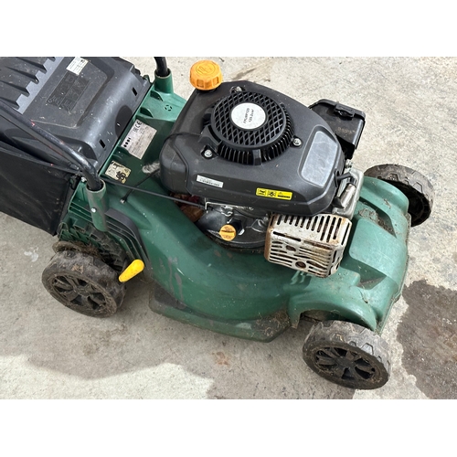 6 - A petrol lawnmower.