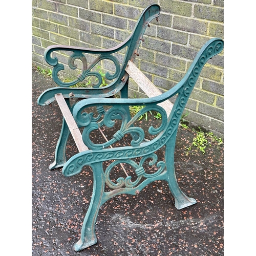 12 - A cast iron garden seat/bench ends.