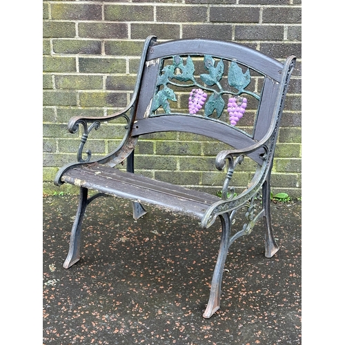 20 - A cast iron garden seat/bench ends.