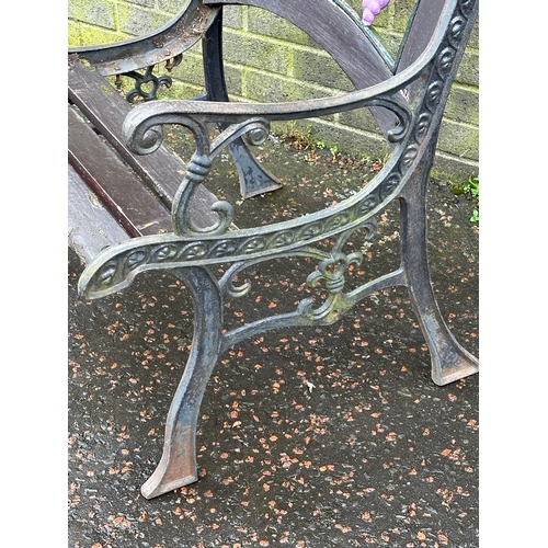 20 - A cast iron garden seat/bench ends.