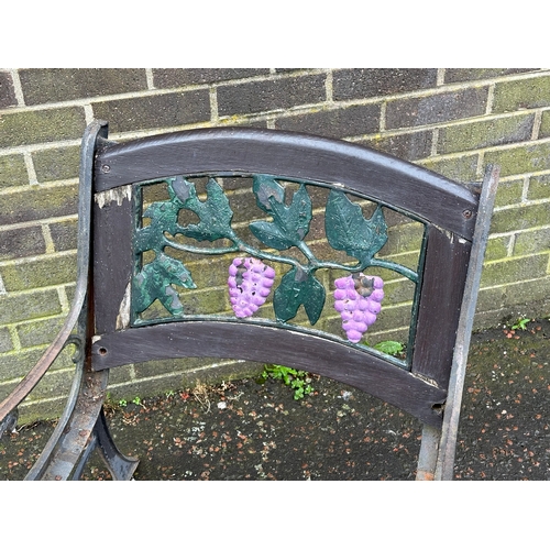 20 - A cast iron garden seat/bench ends.