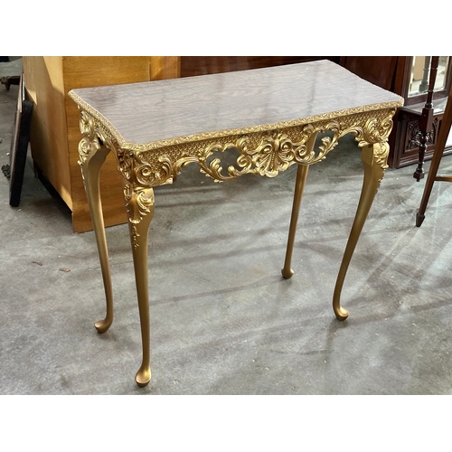 40 - A vintage gilt side table. Needs screws. 79x38x76cm