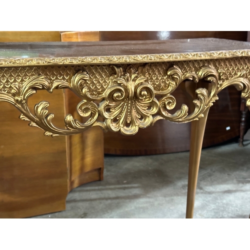 40 - A vintage gilt side table. Needs screws. 79x38x76cm