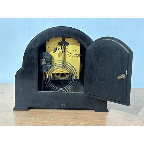 43 - A vintage Art Deco Enfield mantle clock. With pendulum. 25x12x22cm