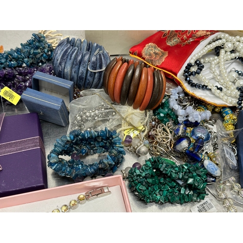 52 - A quantity of costume jewellery. Perfume bottle, watch etc