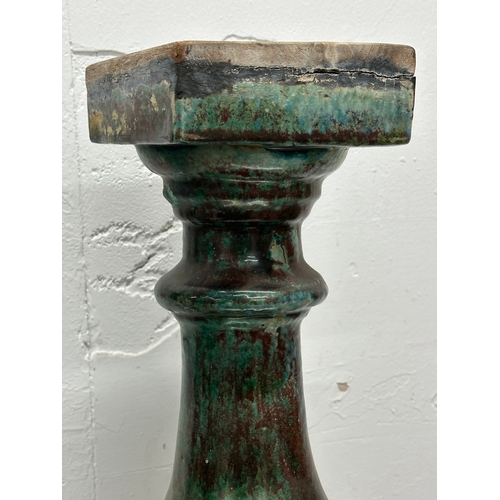 397 - A vintage enamelled stone jardiniere stand. 60cm