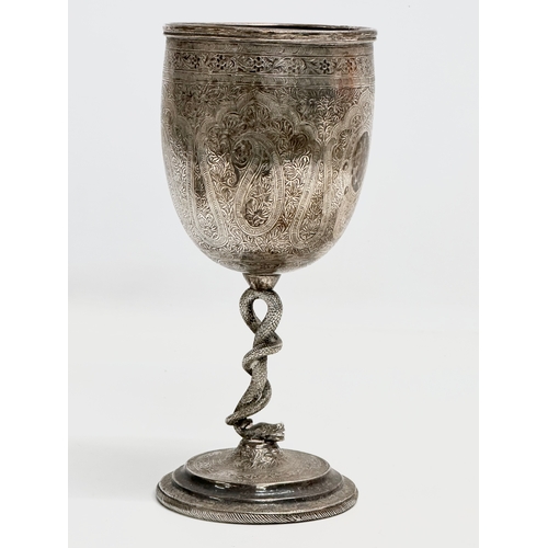 1 - A pair of Late 19th Century Anglo-Indian Kutch silver goblets. With twist serpent stems on raised ci... 