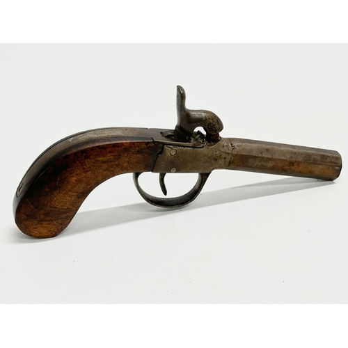 106 - An Early 19th Century percussion boxlock pocket pistol. 18cm