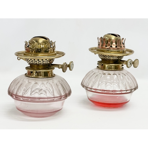 65 - A pair of Victorian wall bracket double burner oil lamps with slice cut bowls. 30x27cm