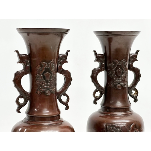 142 - A pair of Late 19th Century Japanese bronze vases. Meiji Period. Circa 1880-1890. 26cm