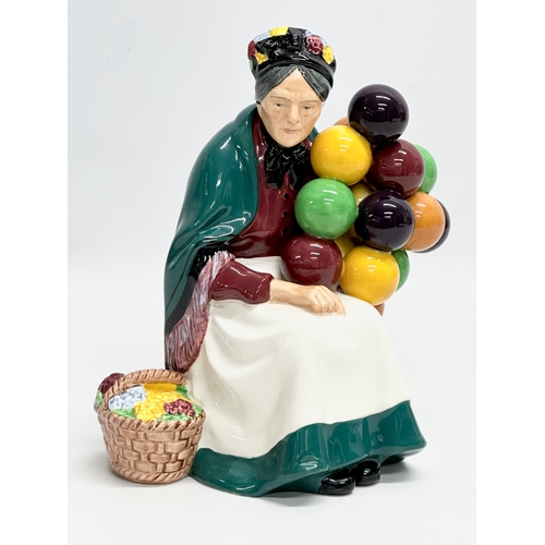 403 - A Royal Doulton ‘The Old Balloon Seller’ figurine. H.N. 1315. 21cm