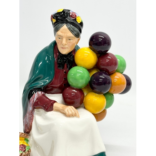 403 - A Royal Doulton ‘The Old Balloon Seller’ figurine. H.N. 1315. 21cm