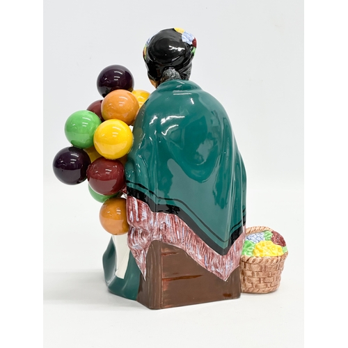 403 - A Royal Doulton ‘The Old Balloon Seller’ figurine. H.N. 1315. 21cm