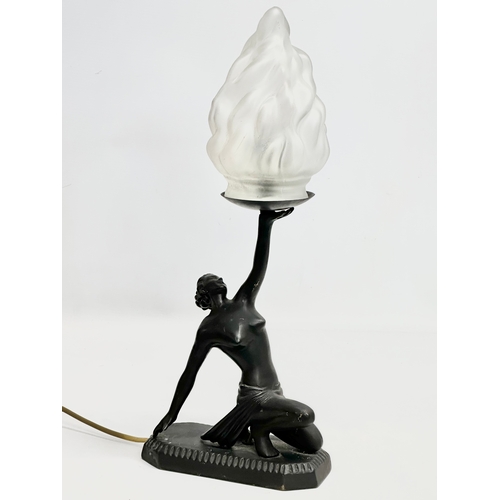 406 - An Art Deco style brass table lamp with flame frosted glass shade. 19x46cm.