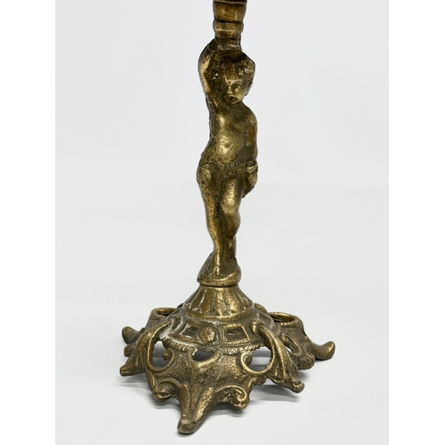 429 - An Early 20th Century brass counter bell. 25cm