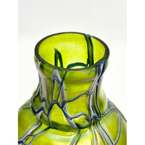 59 - Pallme Konig. An Early 20th Century iridescent threaded glass vase by Pallme-Konig. Circa 1900. 22cm