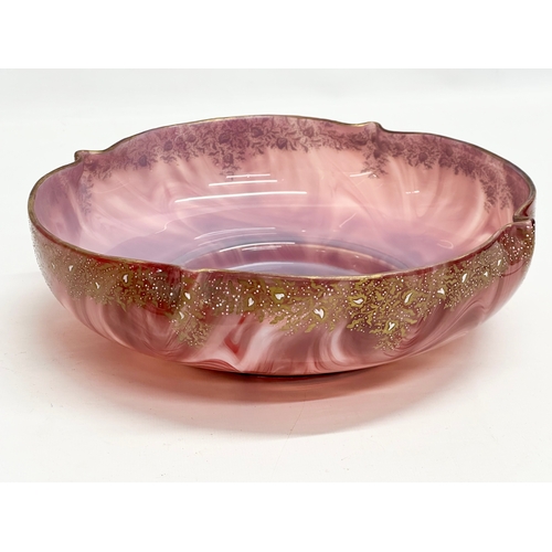 21 - Loetz Carneol. A large Late 19th Century Bohemian glass bowl, with hand painted embossed gilding and... 