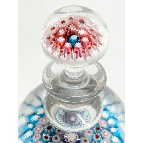 22 - A 19th Century millefiori glass ink bottle and stopper. 14cm