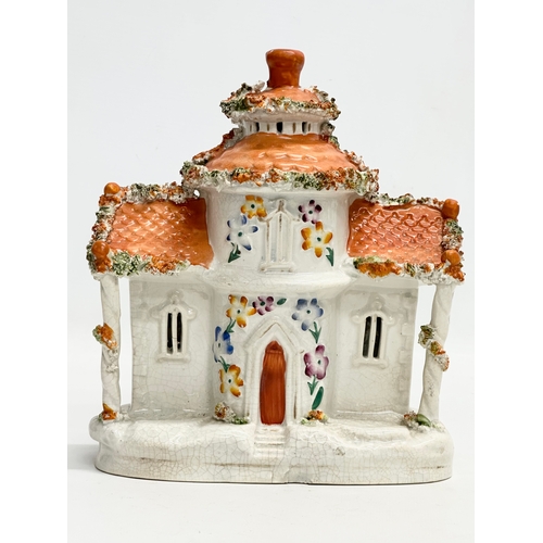 77 - Three 19th Century Staffordshire Pottery houses. 18x21cm. 11x7x13cm. 10x13cm.