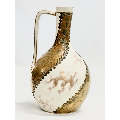 25 - A rare Late 19th Century Doulton Burslem pottery spill vase/ewer. Decorated with painted gilt and br... 