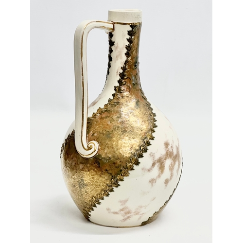 25 - A rare Late 19th Century Doulton Burslem pottery spill vase/ewer. Decorated with painted gilt and br... 