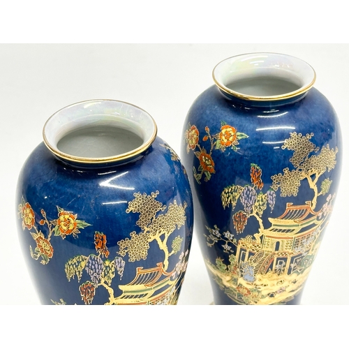 80 - A pair of Early 20th Century Carlton Ware ‘Kang Hsi’ mikado lustre vases. 15.5cm