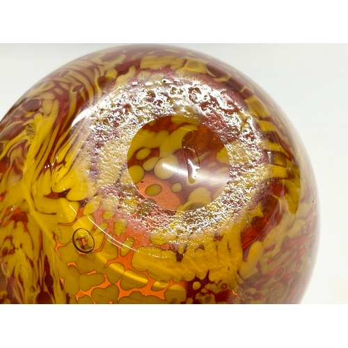 81 - An Early 20th Century art glass jug with gold mica flakes on a ruby ground, and amber glass handle. ... 