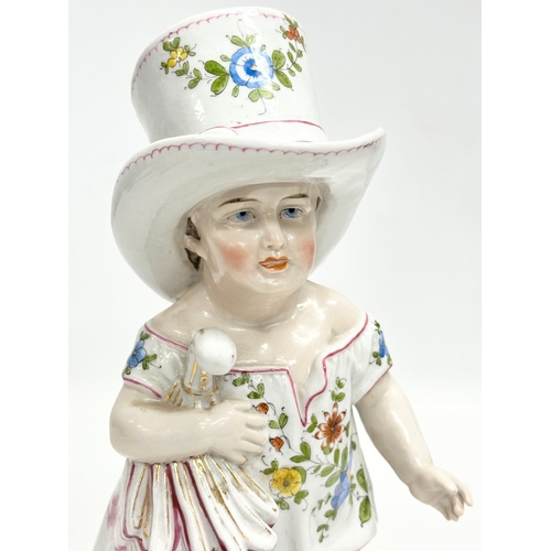 86 - A pair of Late 19th Century German hand painted porcelain ‘Mama Papa’ figurines. 27cm