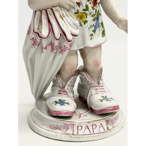 86 - A pair of Late 19th Century German hand painted porcelain ‘Mama Papa’ figurines. 27cm