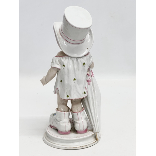 86 - A pair of Late 19th Century German hand painted porcelain ‘Mama Papa’ figurines. 27cm