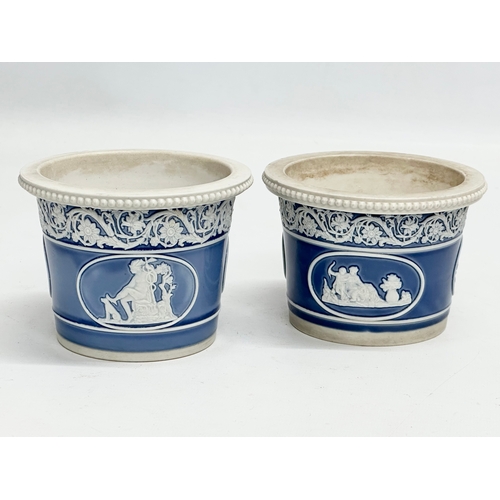 87 - A pair of small Late 19th Century Jasper Ware planters. 11x8cm.