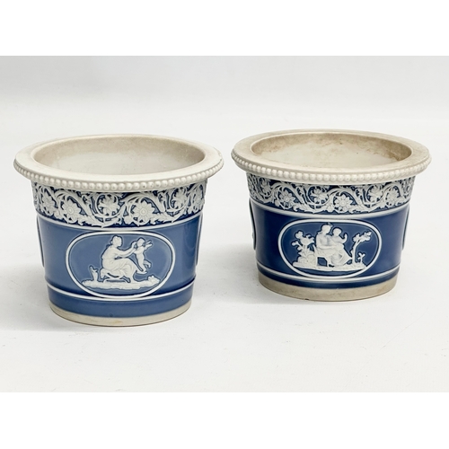 87 - A pair of small Late 19th Century Jasper Ware planters. 11x8cm.