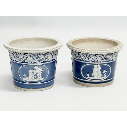 87 - A pair of small Late 19th Century Jasper Ware planters. 11x8cm.