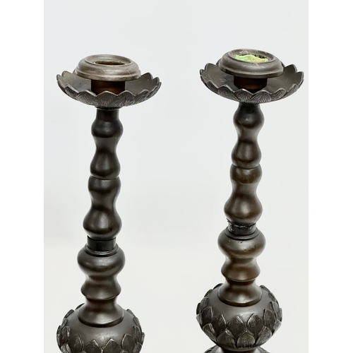 18 - A pair of large 19th Century Chinese bronze censer candlesticks. 41cm