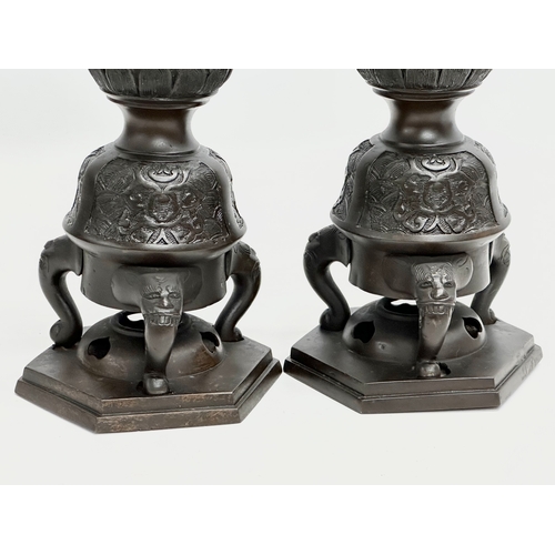 18 - A pair of large 19th Century Chinese bronze censer candlesticks. 41cm