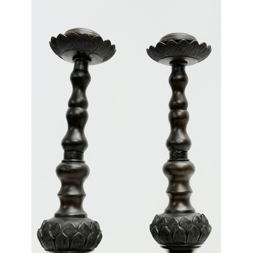 18 - A pair of large 19th Century Chinese bronze censer candlesticks. 41cm