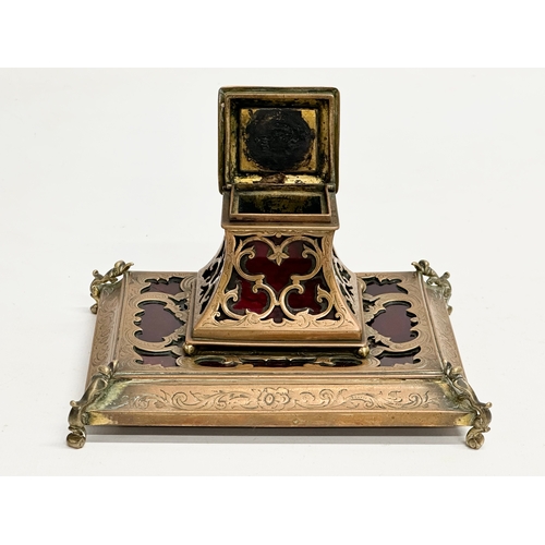 88 - A Mid 19th Century glass boulle style inkstand, mounted with brass open fret. 15x13x10cm