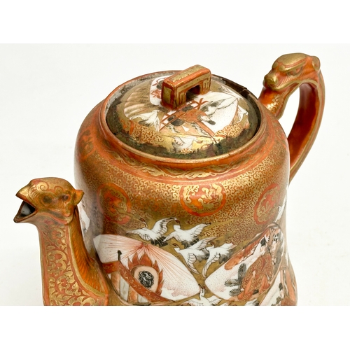 93 - A 19th Century Japanese hand painted teapot by Kutani. Painted figures and birds in flight, with a m... 