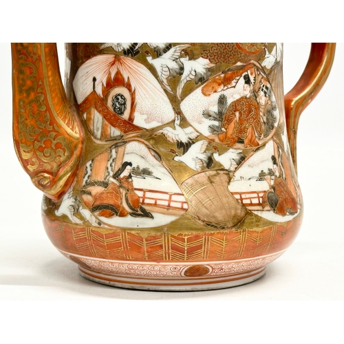 93 - A 19th Century Japanese hand painted teapot by Kutani. Painted figures and birds in flight, with a m... 