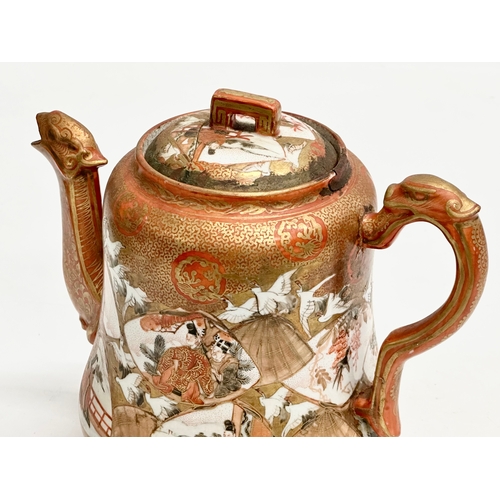 93 - A 19th Century Japanese hand painted teapot by Kutani. Painted figures and birds in flight, with a m... 