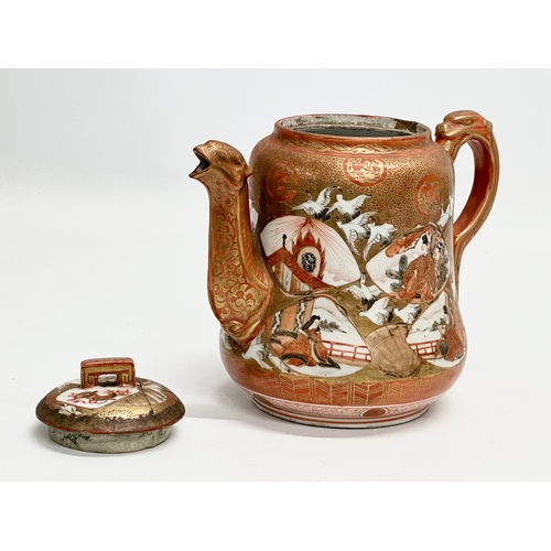 93 - A 19th Century Japanese hand painted teapot by Kutani. Painted figures and birds in flight, with a m... 