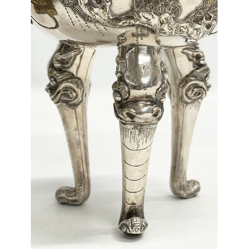 94 - A 20th Century Chinese silver plated urn. Raised on 3 Foo Dog feet, with brass lion mask ring handle... 