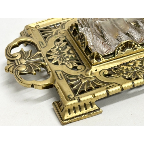 96 - A Late 19th Century Victorian pierced brass inkstand. Makers name. 24x17cm