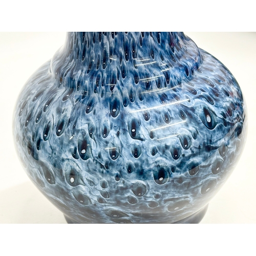 98 - An Early/Mid 20th Century peacock glass vase in the Monart style. 18x22cm.