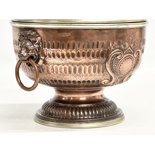 30 - A good quality Late 19th Century copper monteith bowl. With removable crown and lion mask ring handl... 