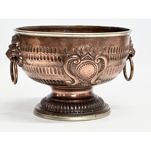 30 - A good quality Late 19th Century copper monteith bowl. With removable crown and lion mask ring handl... 